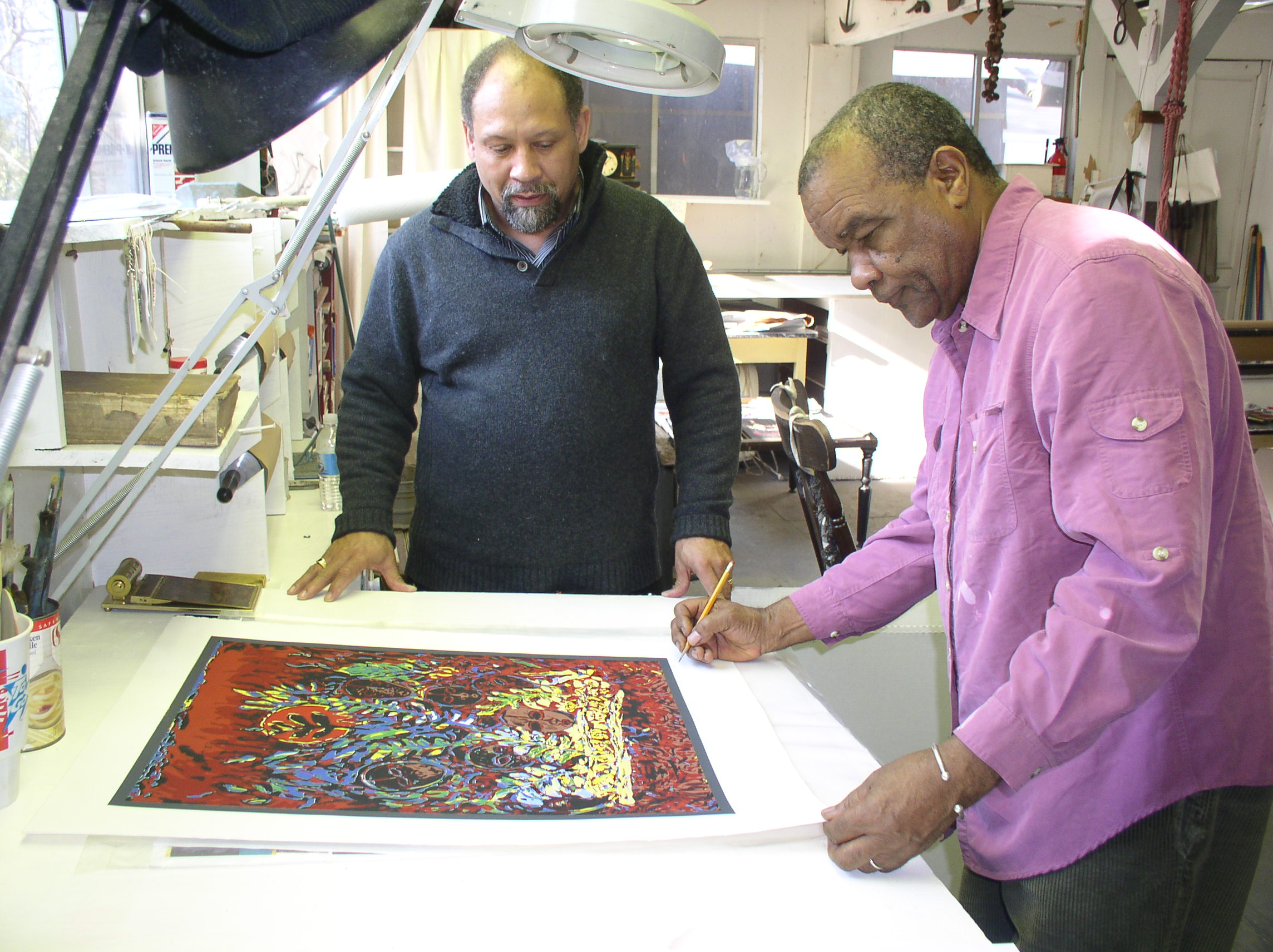 Professors Driskell and Holton signing print