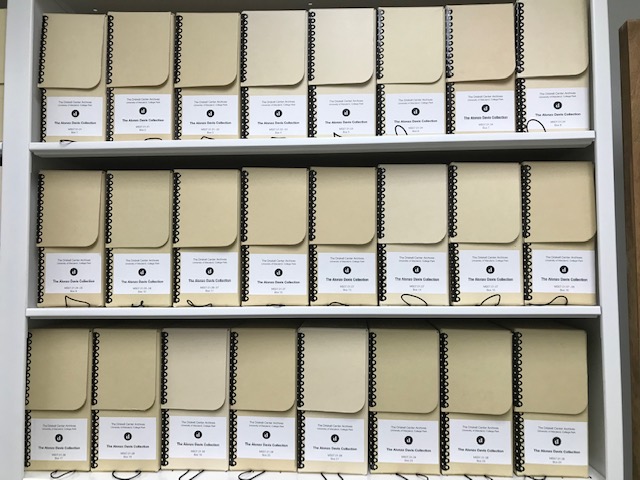 images of shelves of beige boxed archives from the Driskell Center