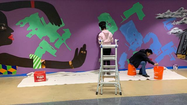 students working on Driskell mural 